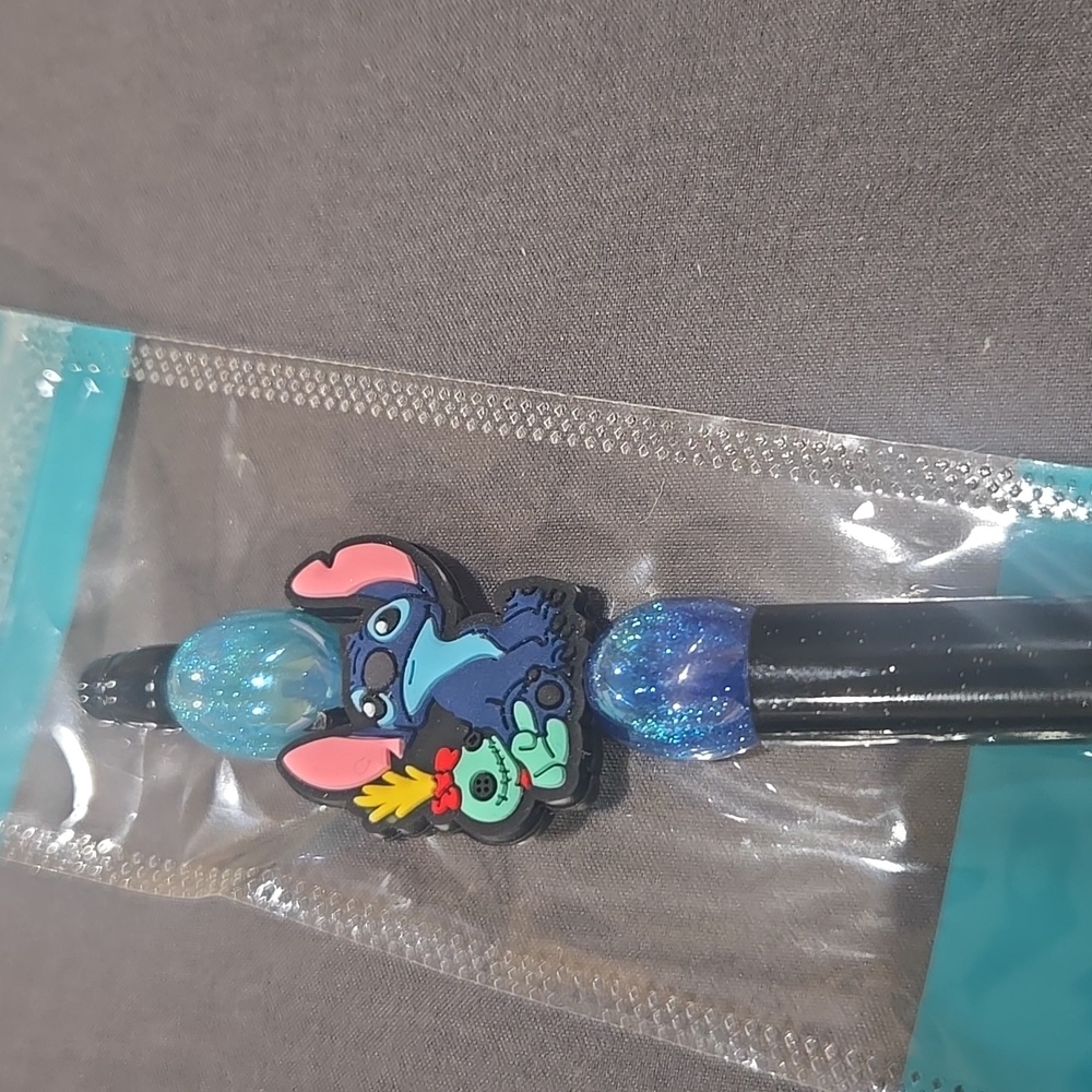 Black Character Stitch Pen. Includes Extra Ink And Black Beads